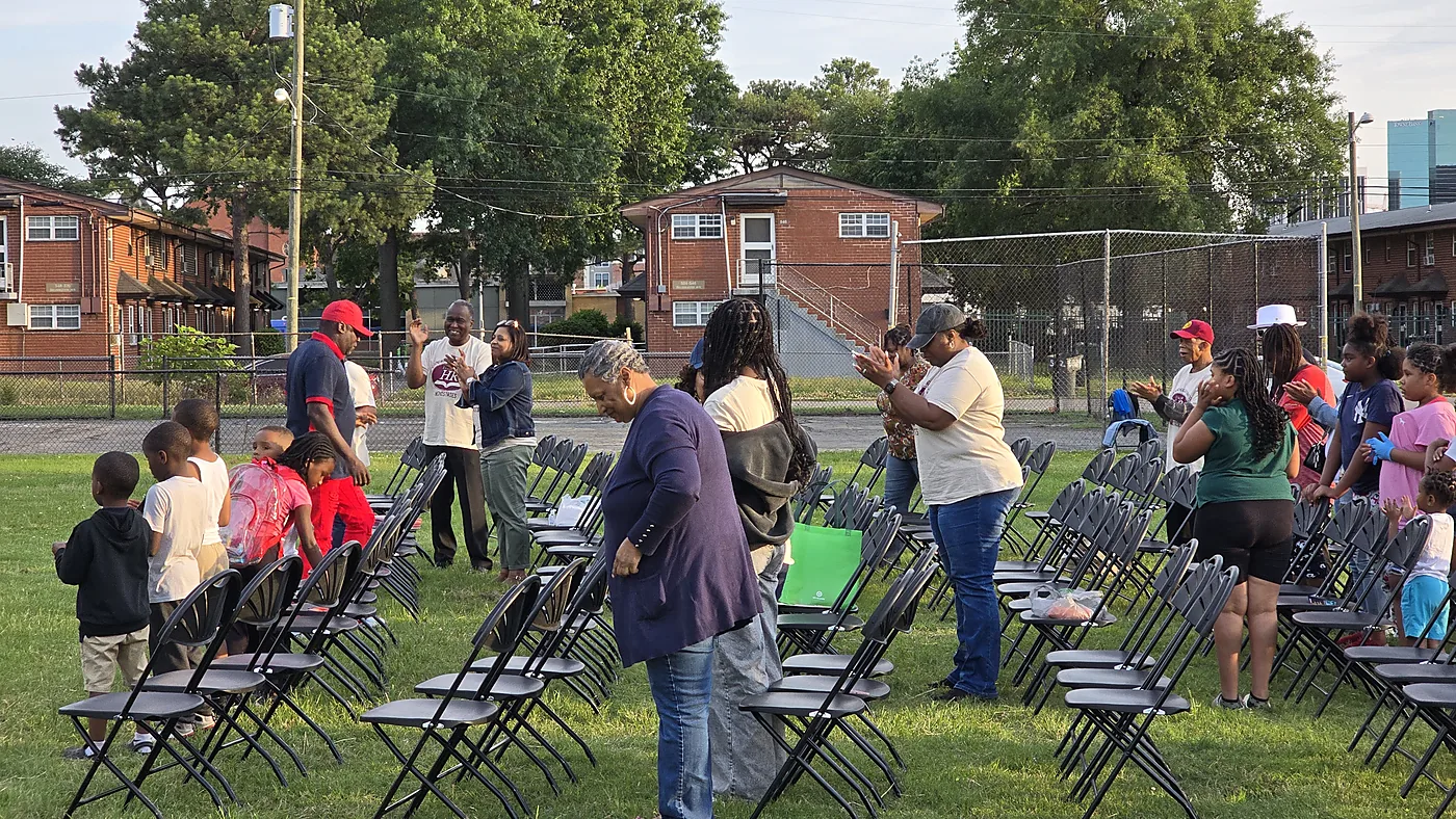 Community members gathered for outdoor ministry